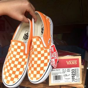 Classic orange checkerboard slip-on Vans